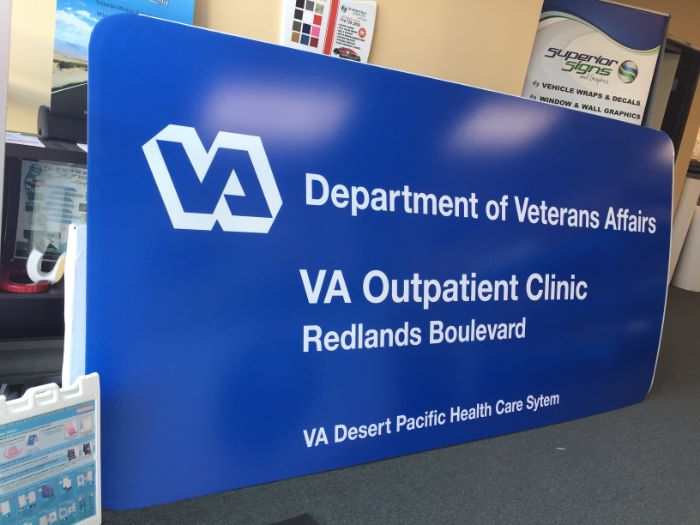 Add translucent vinyl to monument panels in Orange County CA