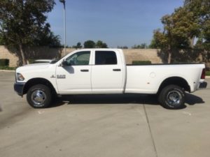 Before and after pictures of black matte truck wraps