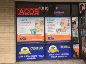 Perforated window graphics for retailers in Paramount CA