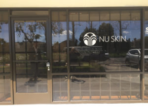 Brand-building vinyl window lettering Cypress CA