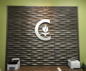 brushed metal lobby logo