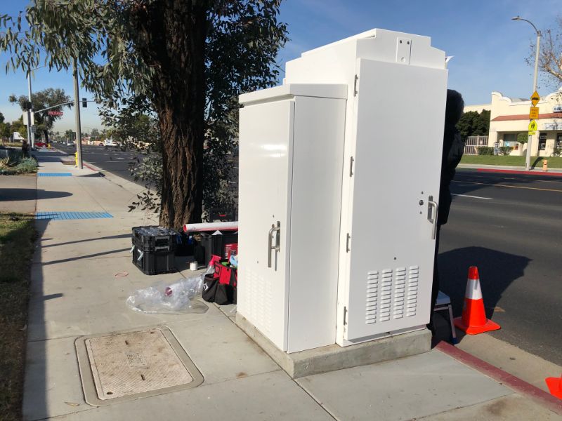 Wrap city electrical boxes in vinyl