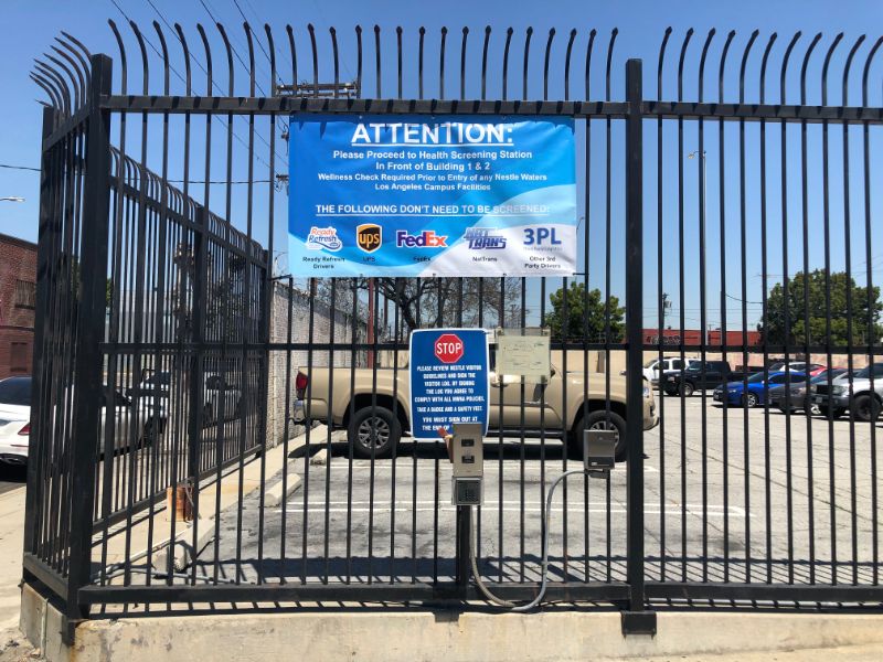 Banners Announce health Screening Requirements Before Entry in LA