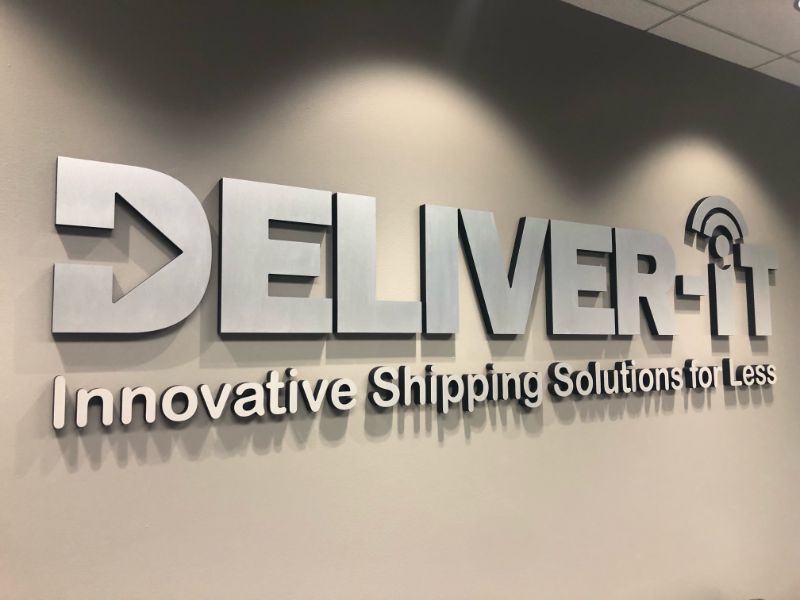 Brushed metal lobby logo signs in Anaheim CA