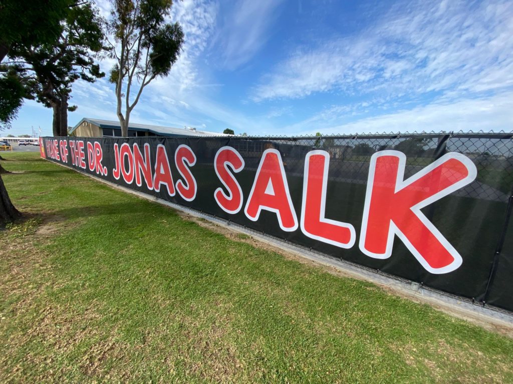 Custom-designed fence banners for schools in Orange County, CA