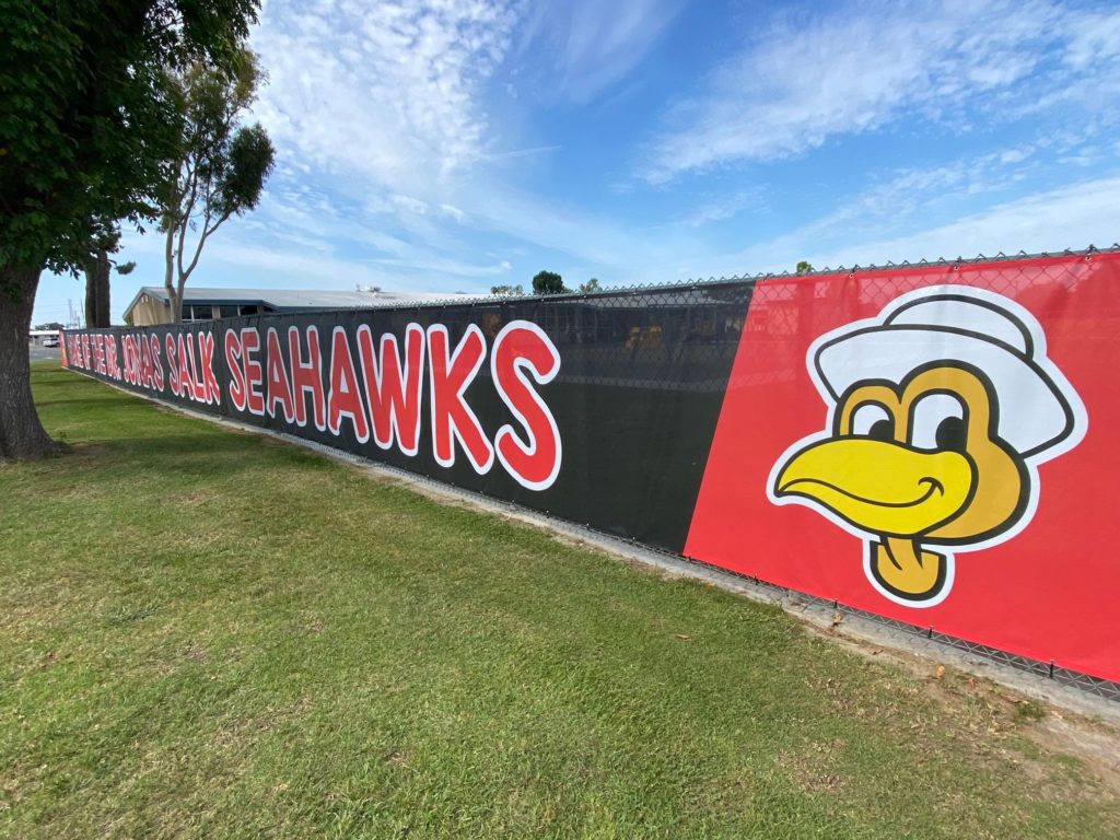 Giant mesh fence banners for schools in Orange County, CA