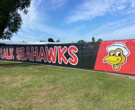 School chain link fence banners in Orange County, CA