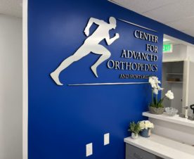 brushed metal lobby logo signs in lakewood, ca