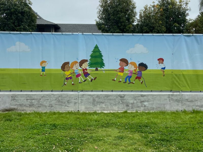 custom designed mesh fence banners for school playrounds in los angeles, ca