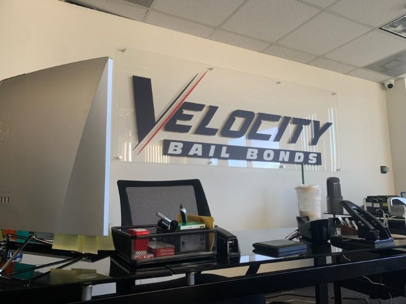 clear acrylic logo wall signs with brushed aluminum wall standoffs in orange county, ca