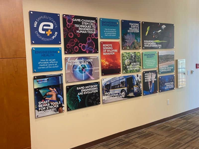 Acrylic panel signs mounted with brushed aluminum wall standoffs in irvine, ca