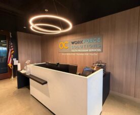 custom logo wall sign ISAT reception area La Mirada CA
