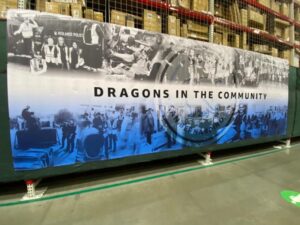 riverside county, ca giant warehouse banners celebrate community involvement by empoyees